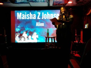 Maisha Z. Johnson. Click to watch Maisha read at Featherboard Writing Series.